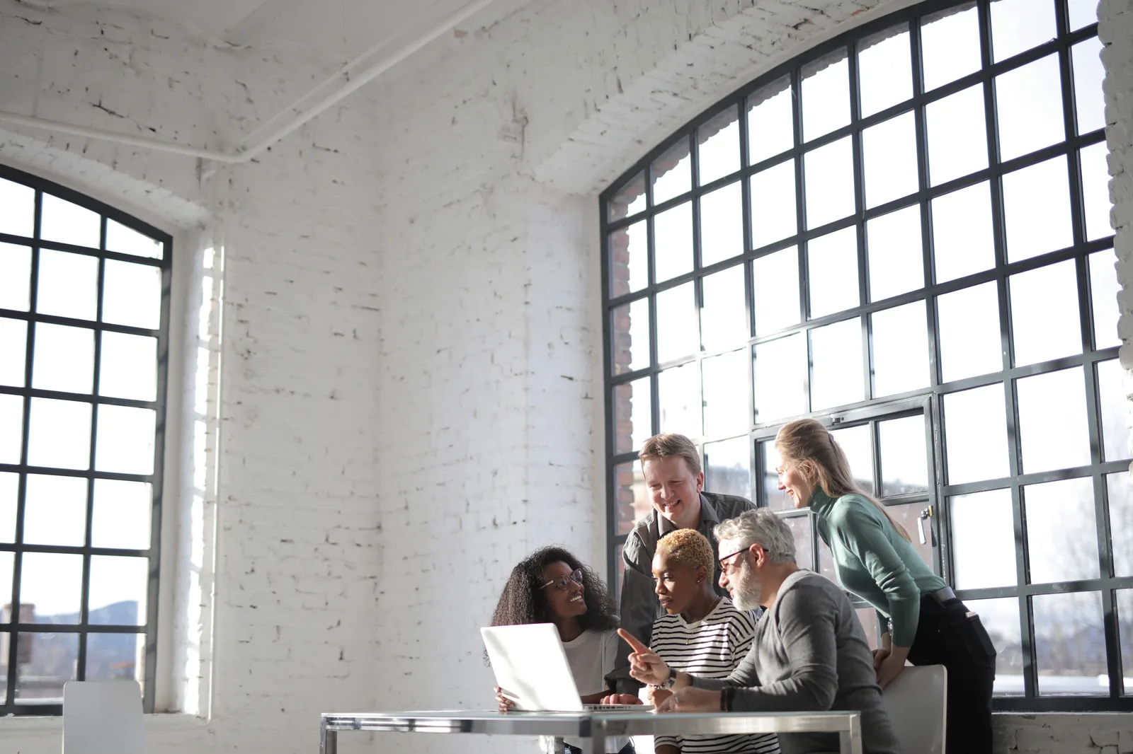 Collaborative team working together in a bright office
